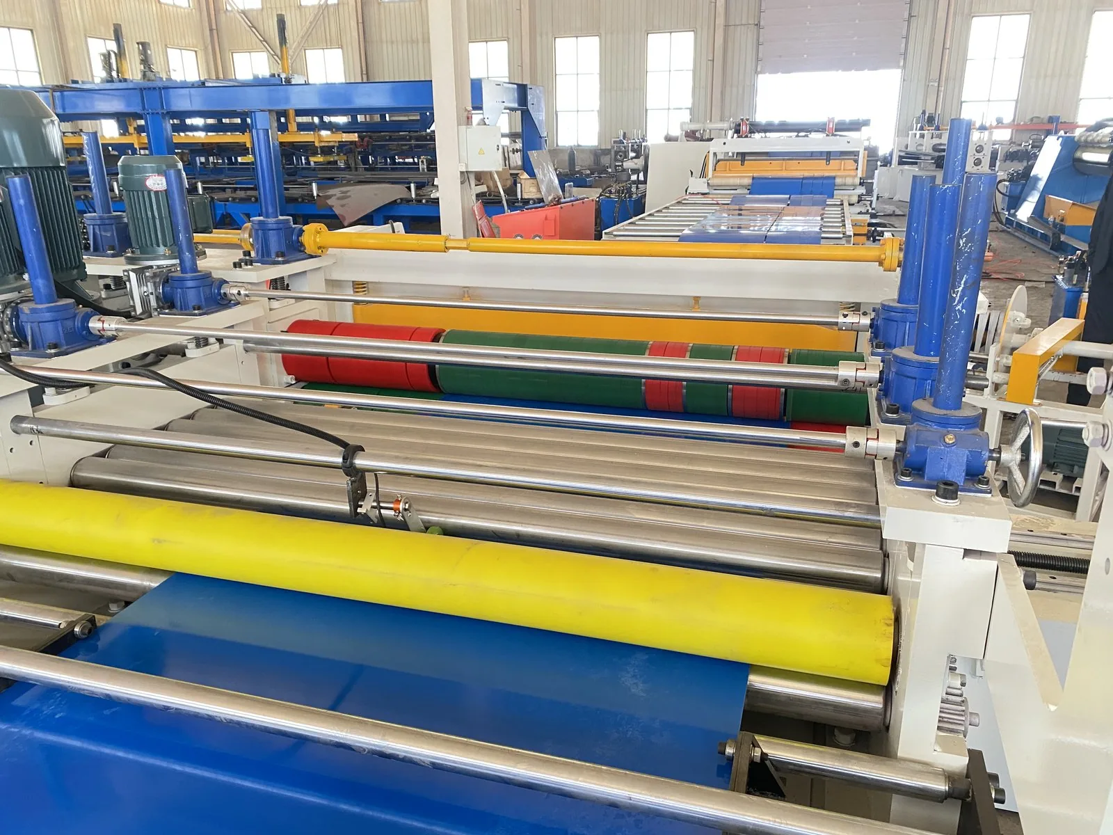 Steel Coil Slitting Line — Leveller and slitting head with strip threaded