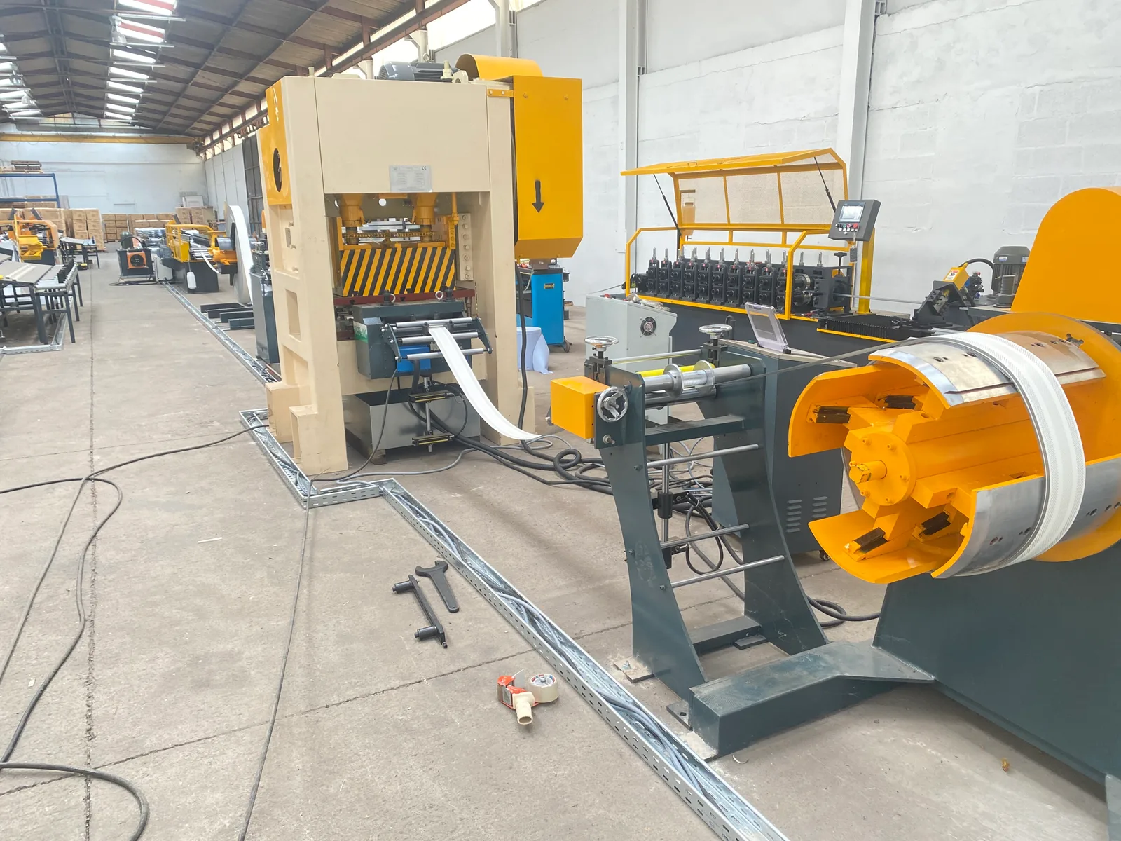 Roll forming line under installation at a customer factory in Belgium