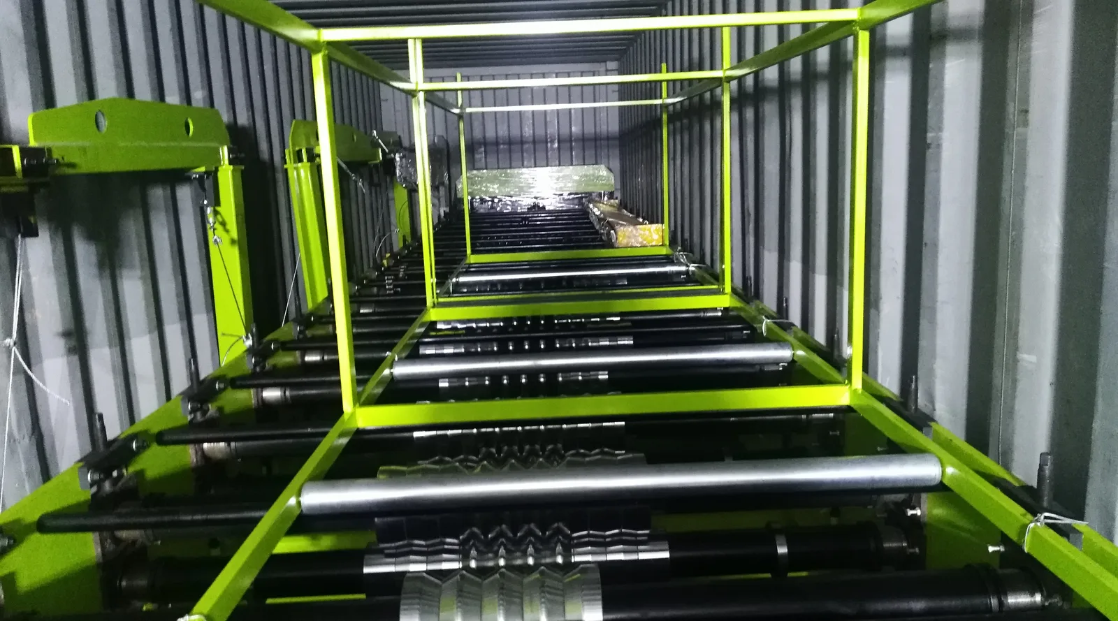 Roll forming machine wrapped in protective film before shipment